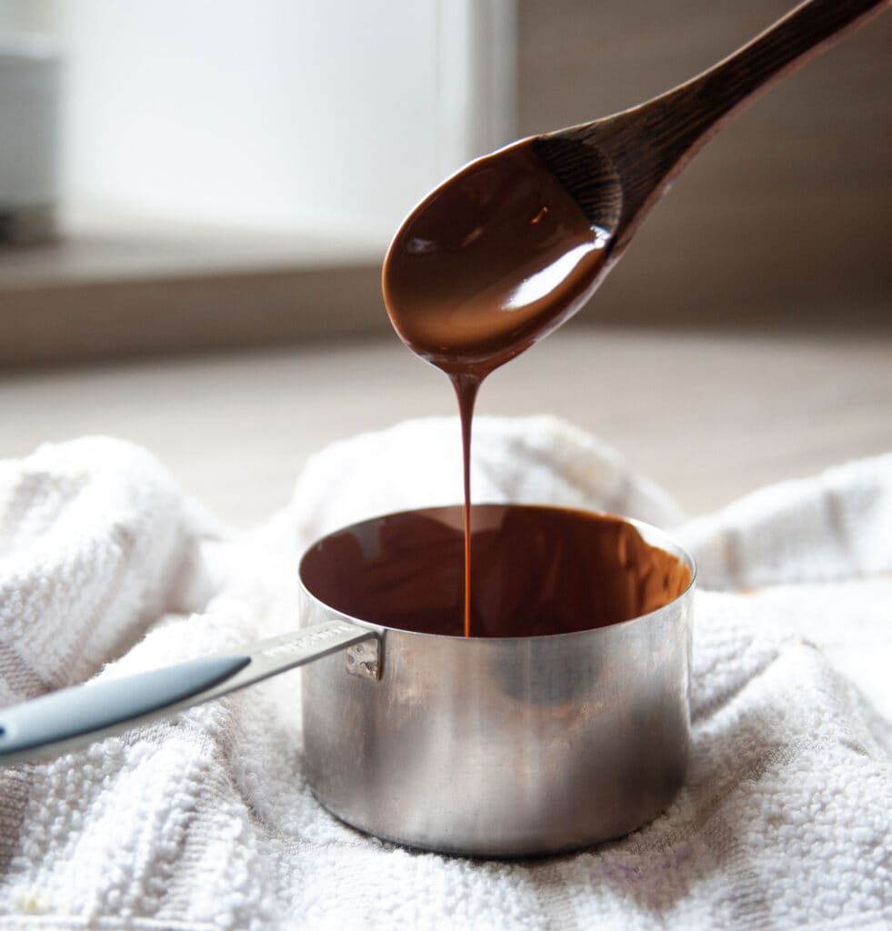 Once everything is combined, gently whisk the mixture until the chocolate is fully melted. 